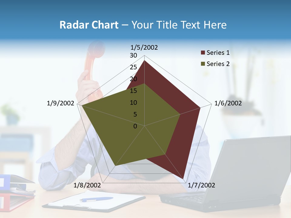A Man Sitting At A Desk With A Laptop And Telephone PowerPoint Template
