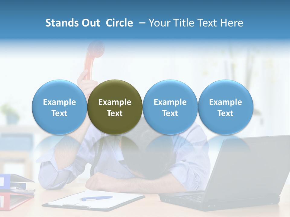 A Man Sitting At A Desk With A Laptop And Telephone PowerPoint Template