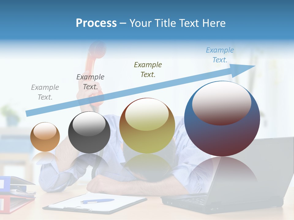 A Man Sitting At A Desk With A Laptop And Telephone PowerPoint Template