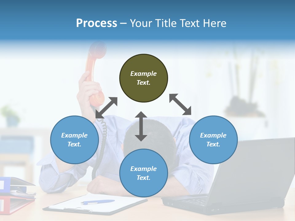A Man Sitting At A Desk With A Laptop And Telephone PowerPoint Template