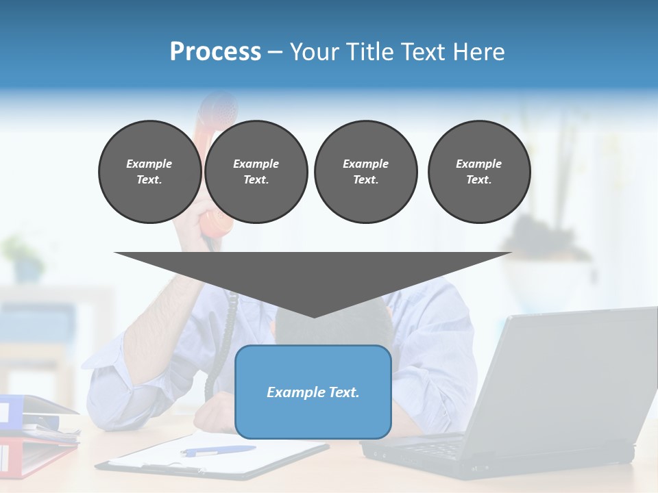 A Man Sitting At A Desk With A Laptop And Telephone PowerPoint Template