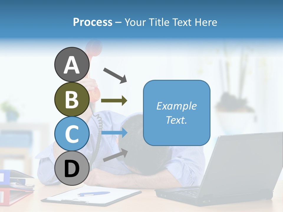 A Man Sitting At A Desk With A Laptop And Telephone PowerPoint Template