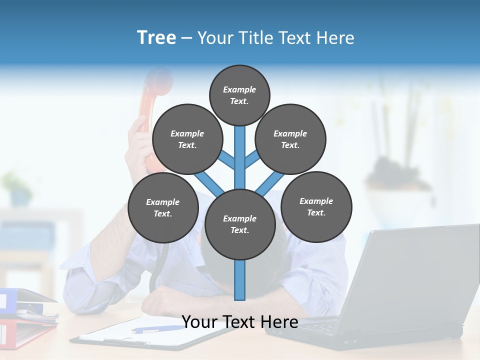 A Man Sitting At A Desk With A Laptop And Telephone PowerPoint Template