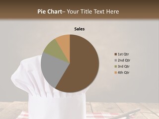 A Chef's Hat Sitting On Top Of A Wooden Table PowerPoint Template