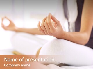 A Woman Sitting On A Bed With Her Hands In The Air PowerPoint Template