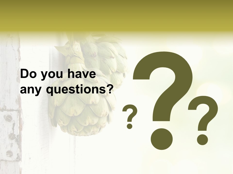 A Bunch Of Unripe Bananas Hanging On A Wall PowerPoint Template