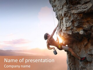 A Man Climbing Up The Side Of A Mountain PowerPoint Template