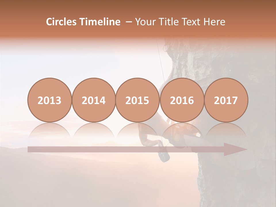 A Man Climbing Up The Side Of A Mountain PowerPoint Template