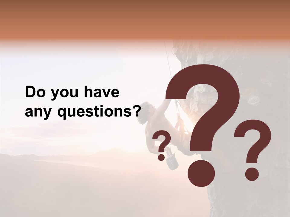 A Man Climbing Up The Side Of A Mountain PowerPoint Template