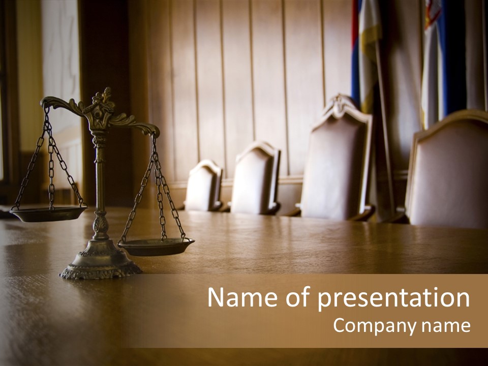 A Wooden Table Topped With A Scale Of Justice PowerPoint Template