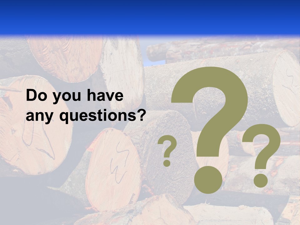 A Pile Of Logs With A Crane In The Background PowerPoint Template