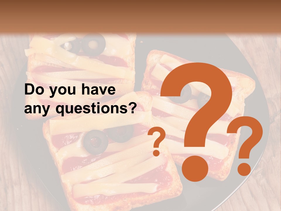 A Black Plate Topped With Slices Of Pizza Covered In Cheese And Olives PowerPoint Template