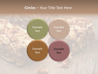 A Wooden Table Topped With Granola And Nuts PowerPoint Template
