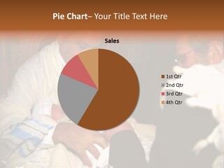 A Man Is Holding A Baby In His Lap PowerPoint Template