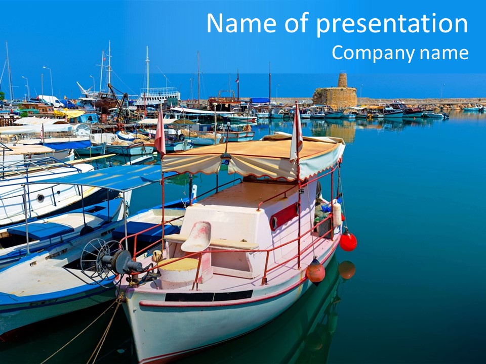 A Group Of Boats Are Docked In The Water PowerPoint Template