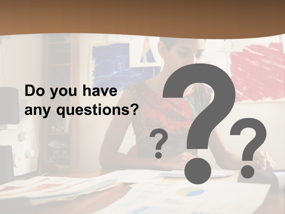 A Woman Sitting At A Desk Writing On A Piece Of Paper PowerPoint Template