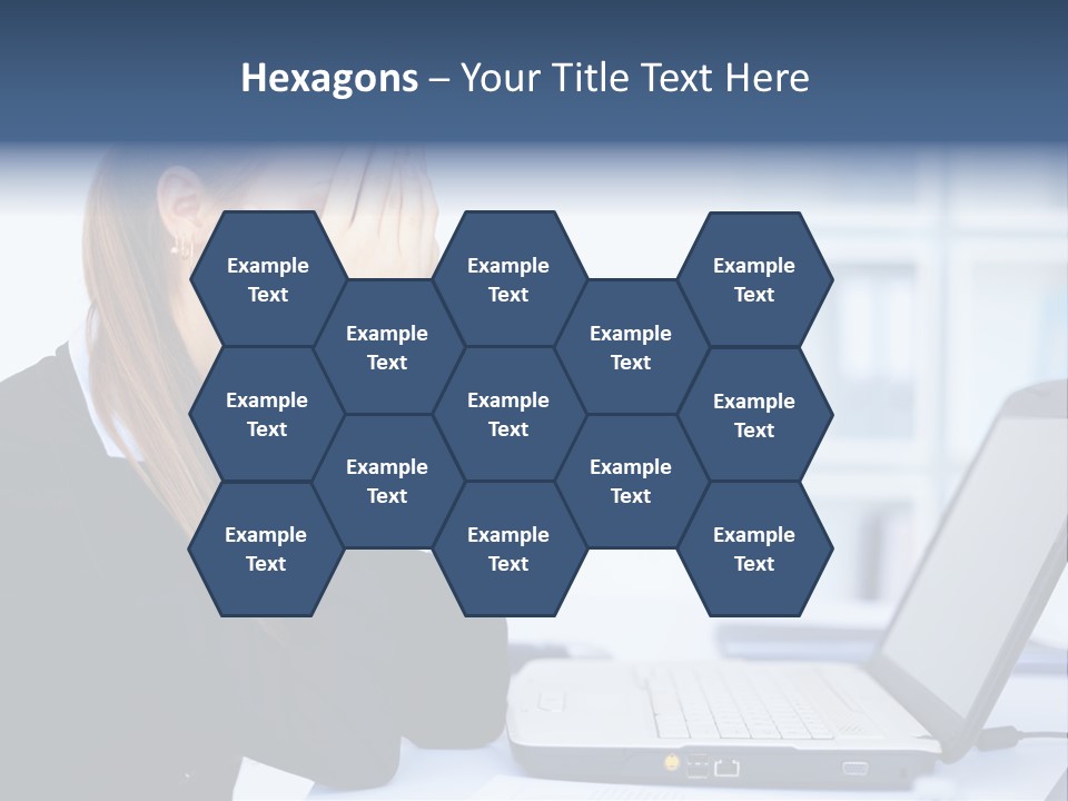 A Woman Sitting At A Desk Covering Her Face With Her Hands PowerPoint Template