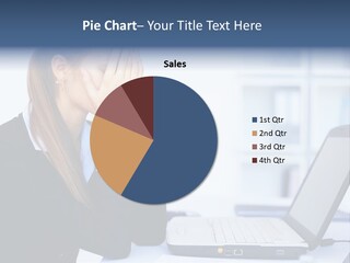 A Woman Sitting At A Desk Covering Her Face With Her Hands PowerPoint Template