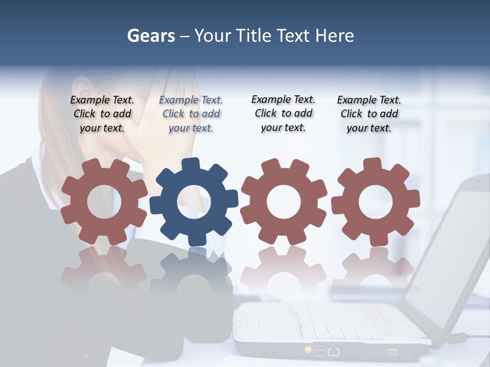 A Woman Sitting At A Desk Covering Her Face With Her Hands PowerPoint Template