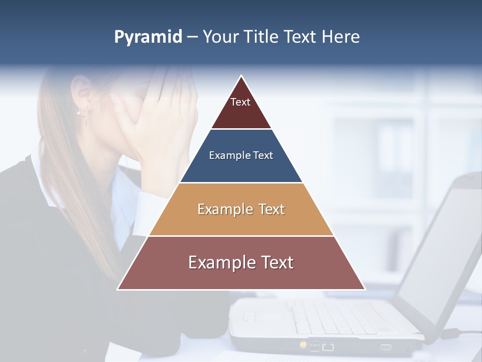 A Woman Sitting At A Desk Covering Her Face With Her Hands PowerPoint Template