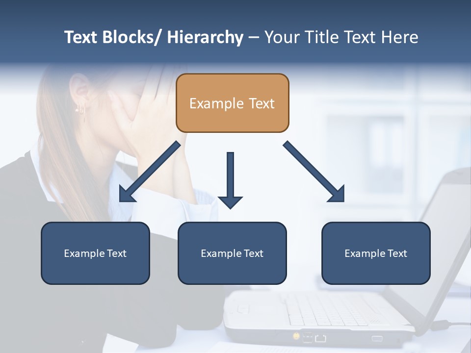 A Woman Sitting At A Desk Covering Her Face With Her Hands PowerPoint Template