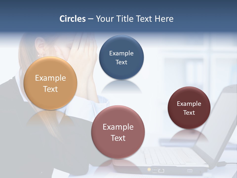 A Woman Sitting At A Desk Covering Her Face With Her Hands PowerPoint Template