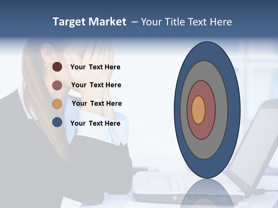 A Woman Sitting At A Desk Covering Her Face With Her Hands PowerPoint Template