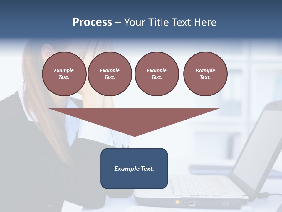 A Woman Sitting At A Desk Covering Her Face With Her Hands PowerPoint Template