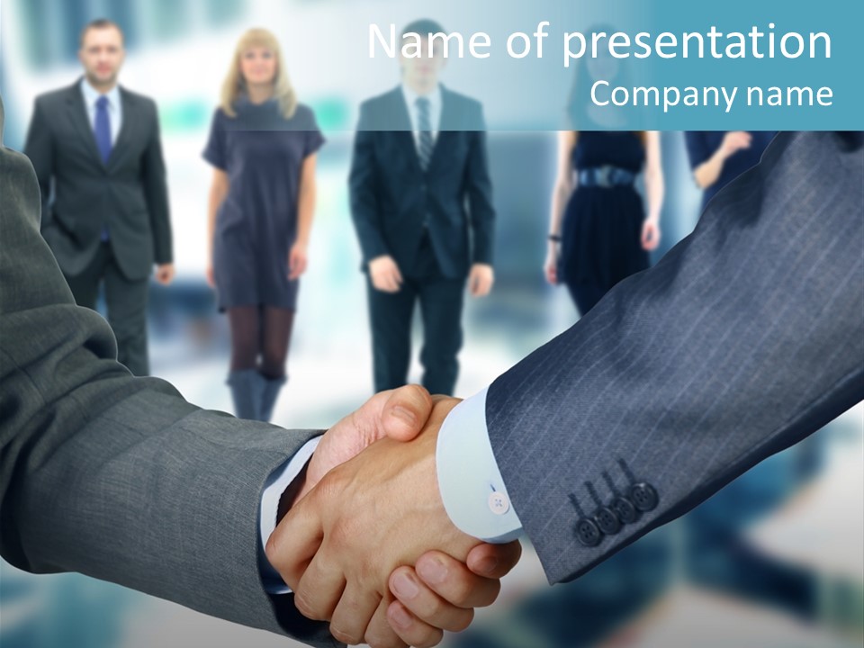 Two Men Shaking Hands In Front Of A Group Of People PowerPoint Template