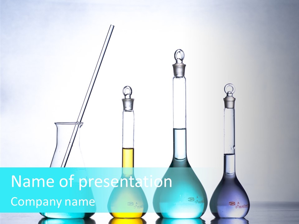 A Group Of Flasks And Beakles With Liquid In Them PowerPoint Template