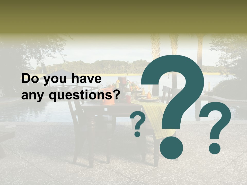 A Table With Chairs Near A Swimming Pool PowerPoint Template