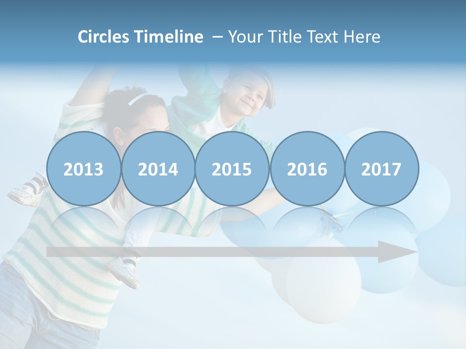 A Woman Holding A Child In Her Arms With Balloons In The Background PowerPoint Template