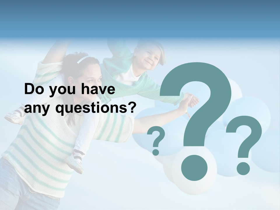 A Woman Holding A Child In Her Arms With Balloons In The Background PowerPoint Template