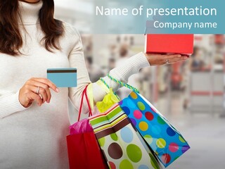 A Woman Holding Shopping Bags And A Credit Card PowerPoint Template