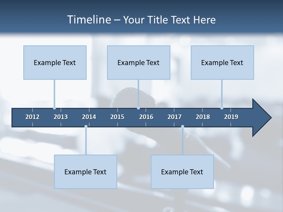 A Microphone On A Table With A Blurry Background PowerPoint Template