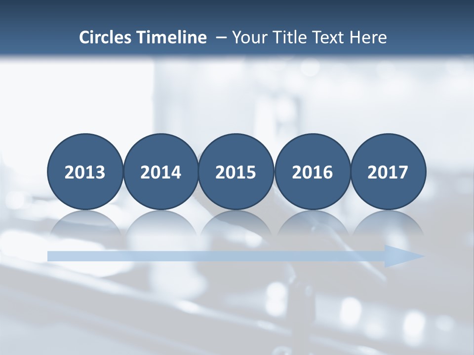 A Microphone On A Table With A Blurry Background PowerPoint Template