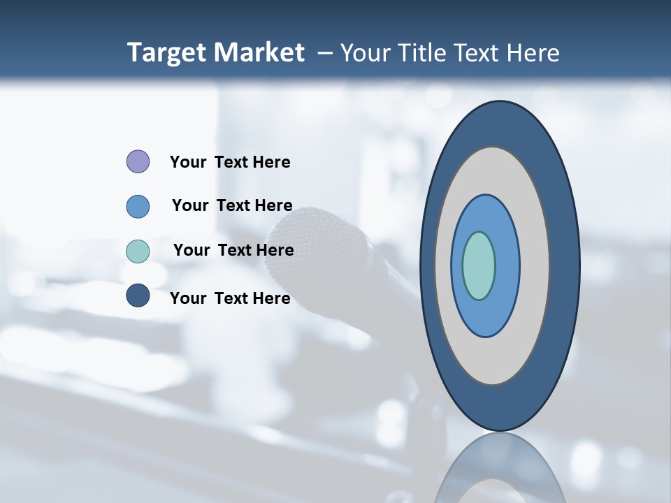 A Microphone On A Table With A Blurry Background PowerPoint Template