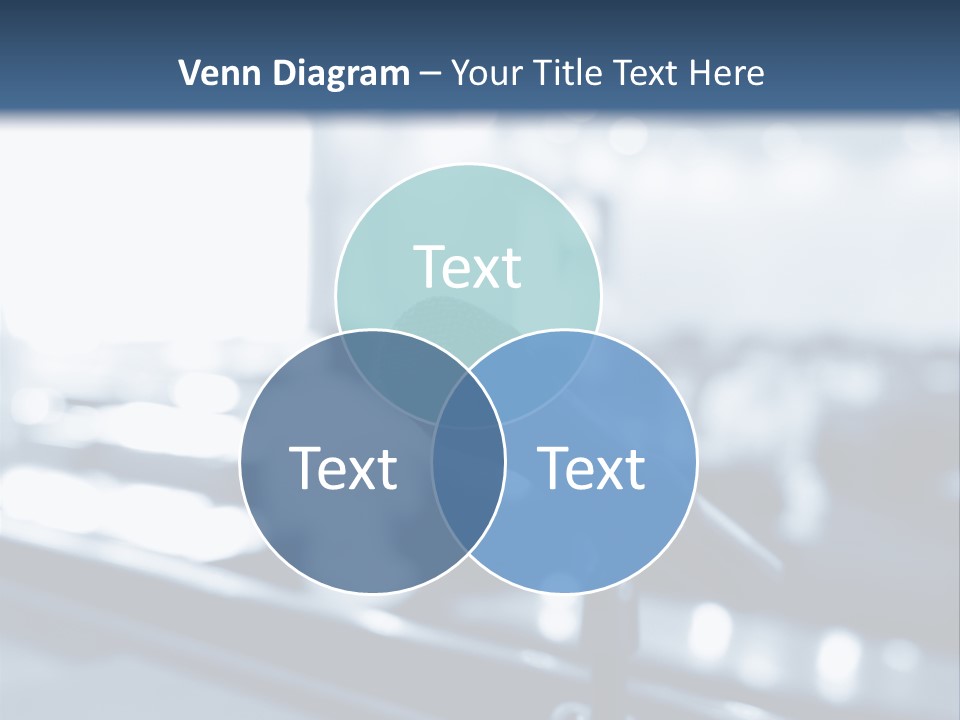 A Microphone On A Table With A Blurry Background PowerPoint Template