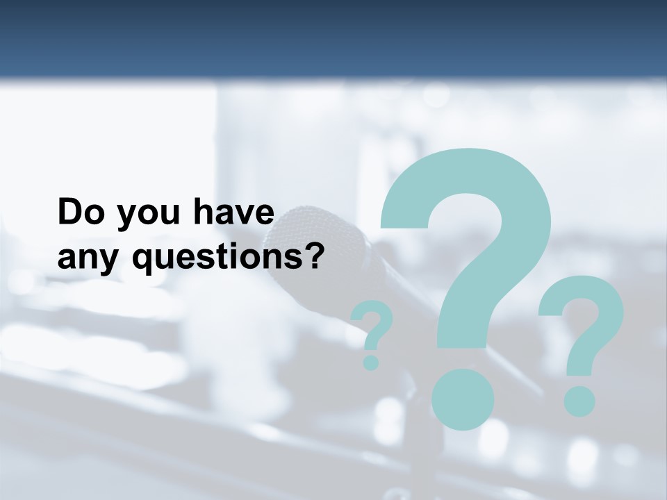 A Microphone On A Table With A Blurry Background PowerPoint Template