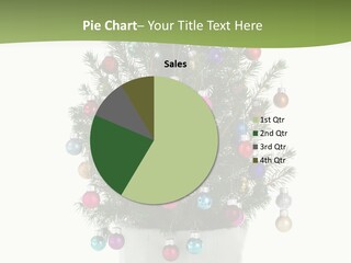 A Small Christmas Tree In A Pot With Ornaments On It PowerPoint Template