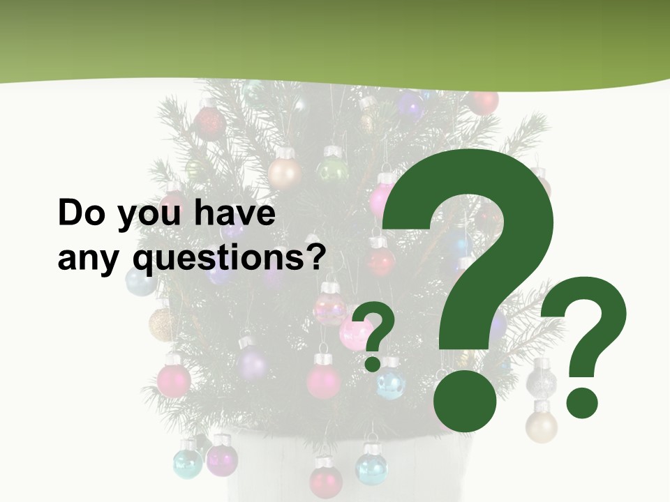 A Small Christmas Tree In A Pot With Ornaments On It PowerPoint Template