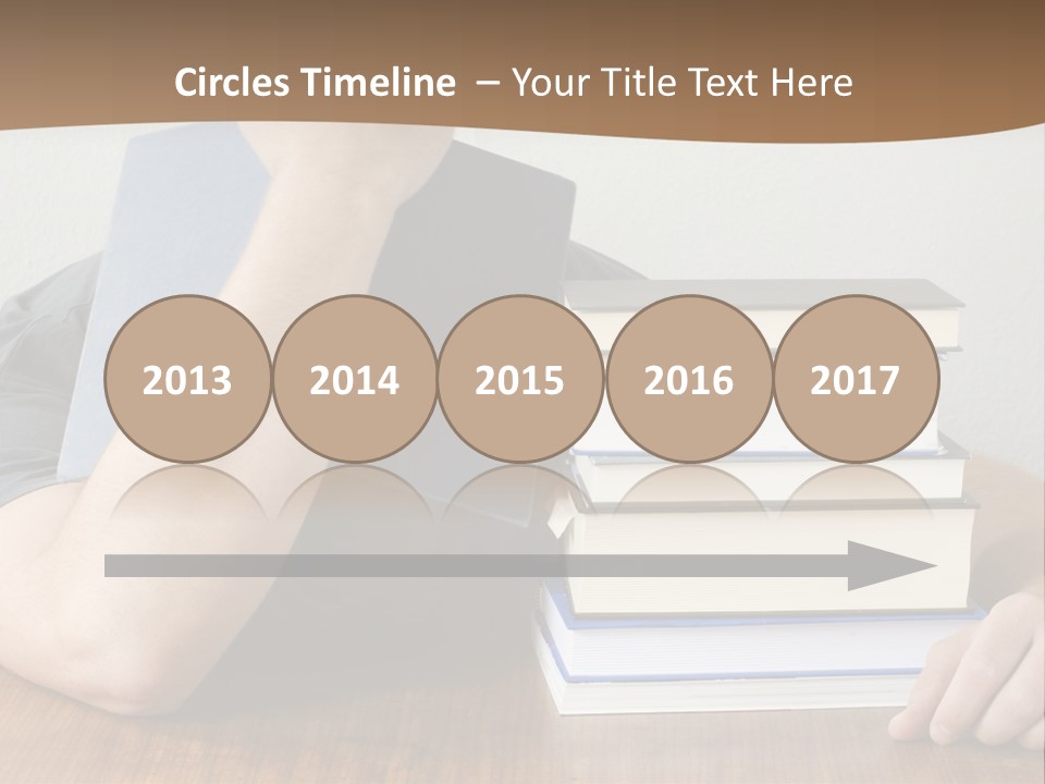 A Person Sitting At A Table With A Stack Of Books PowerPoint Template