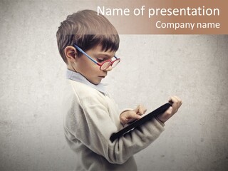 A Young Boy Wearing Glasses Holding A Tablet PowerPoint Template