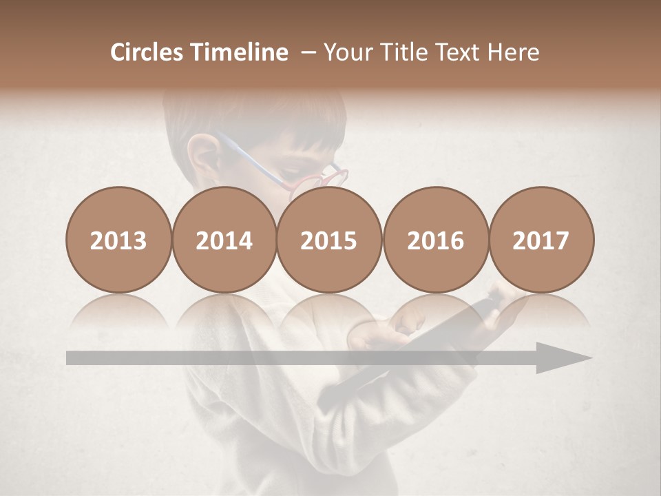 A Young Boy Wearing Glasses Holding A Tablet PowerPoint Template