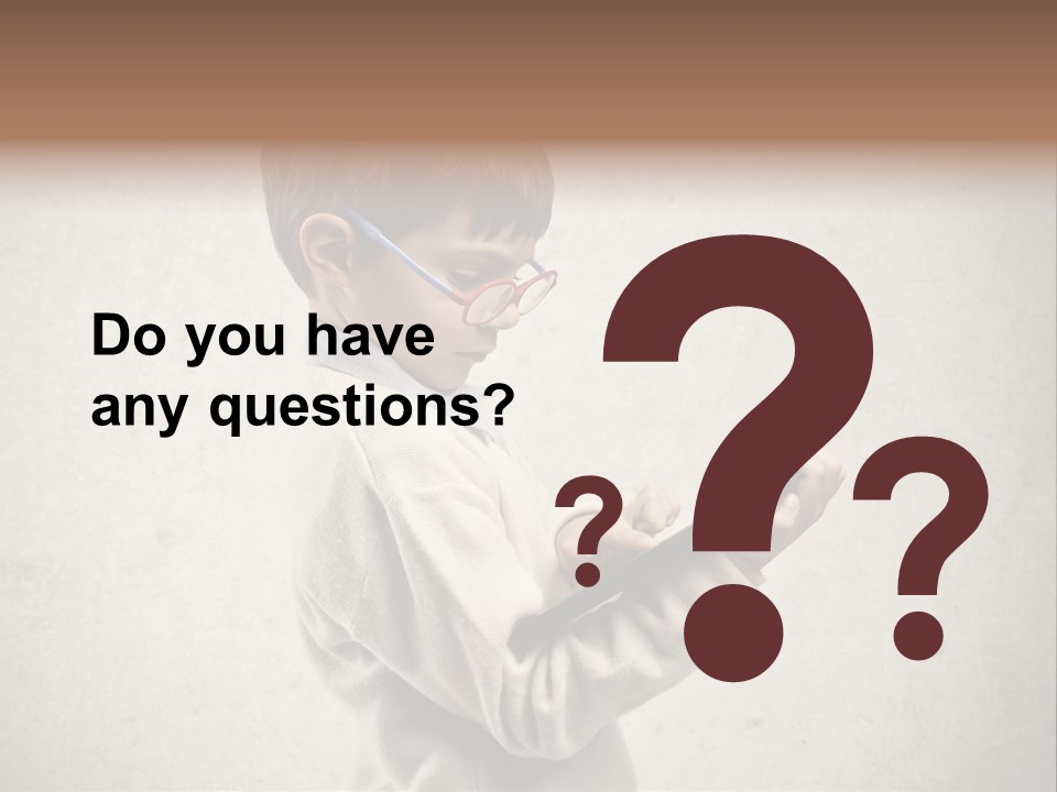 A Young Boy Wearing Glasses Holding A Tablet PowerPoint Template