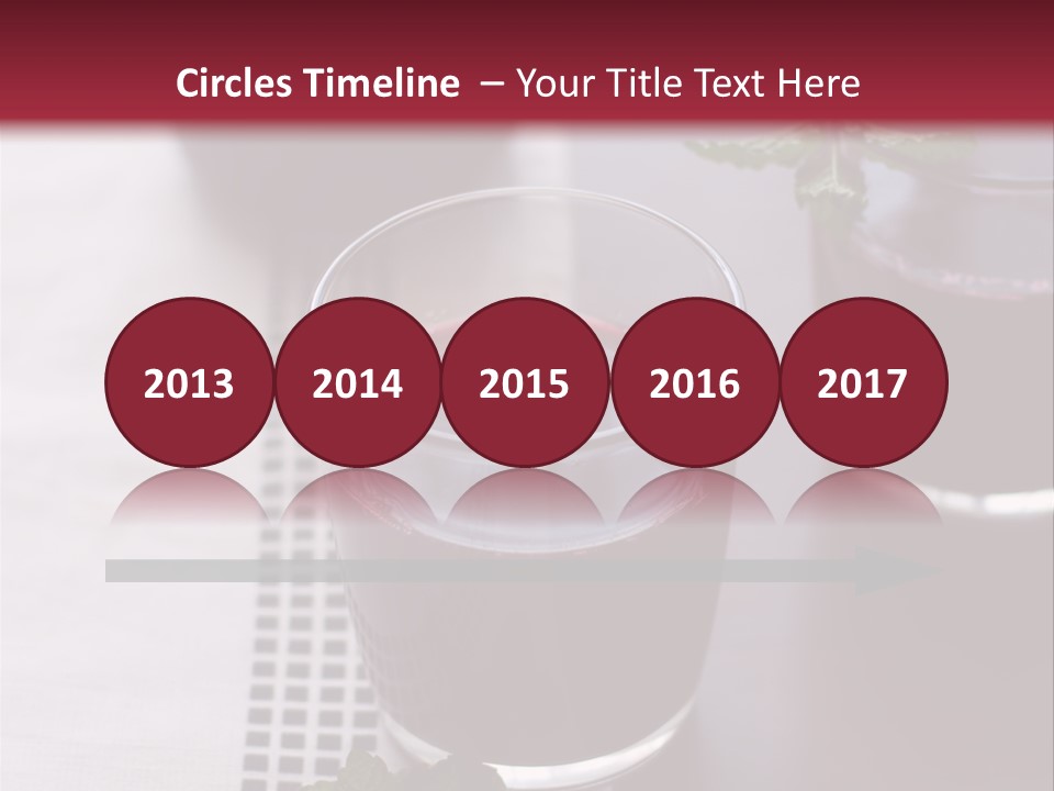 A Table Topped With Glasses Filled With Liquid PowerPoint Template