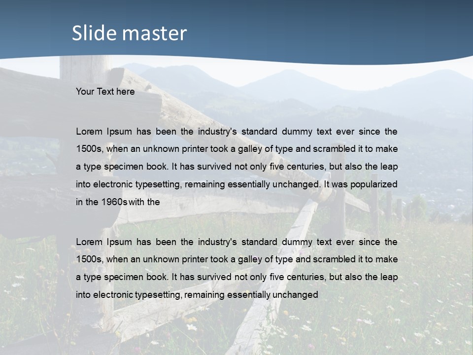 A Wooden Fence In A Grassy Field With Mountains In The Background PowerPoint Template