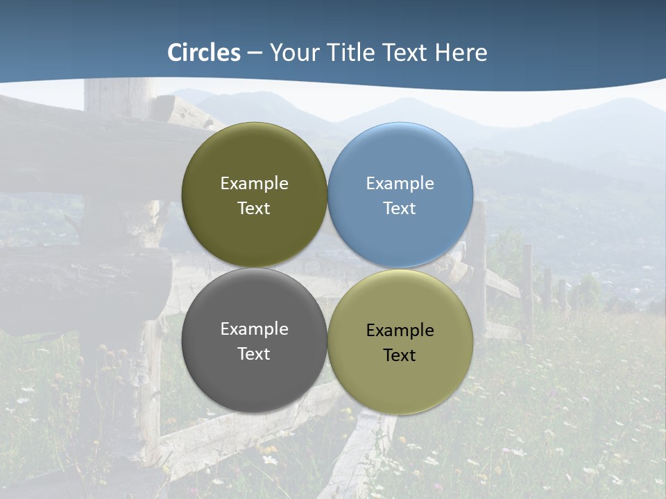 A Wooden Fence In A Grassy Field With Mountains In The Background PowerPoint Template