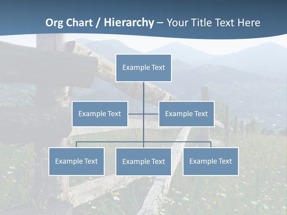 A Wooden Fence In A Grassy Field With Mountains In The Background PowerPoint Template