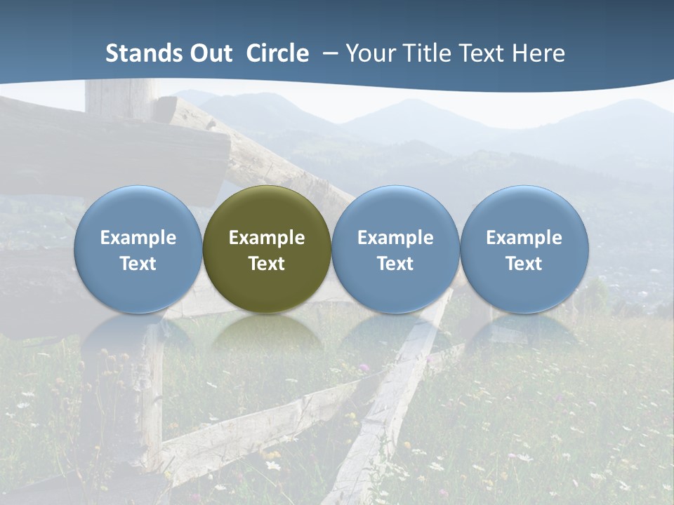 A Wooden Fence In A Grassy Field With Mountains In The Background PowerPoint Template